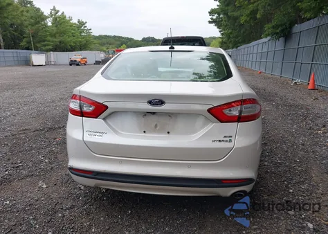 2015 Ford Fusion Hybrid Se z USA, uszkodzony, nr VIN 3FA6P0LU4FR202410